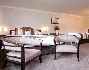 Day room suitable for a family at The Old Golf House Hotel.