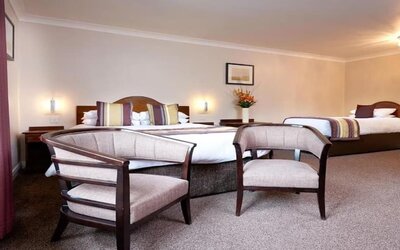 Day room suitable for a family at The Old Golf House Hotel.