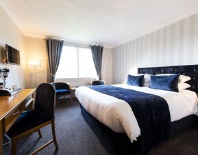 Day room with workspace at The Old Golf House Hotel.