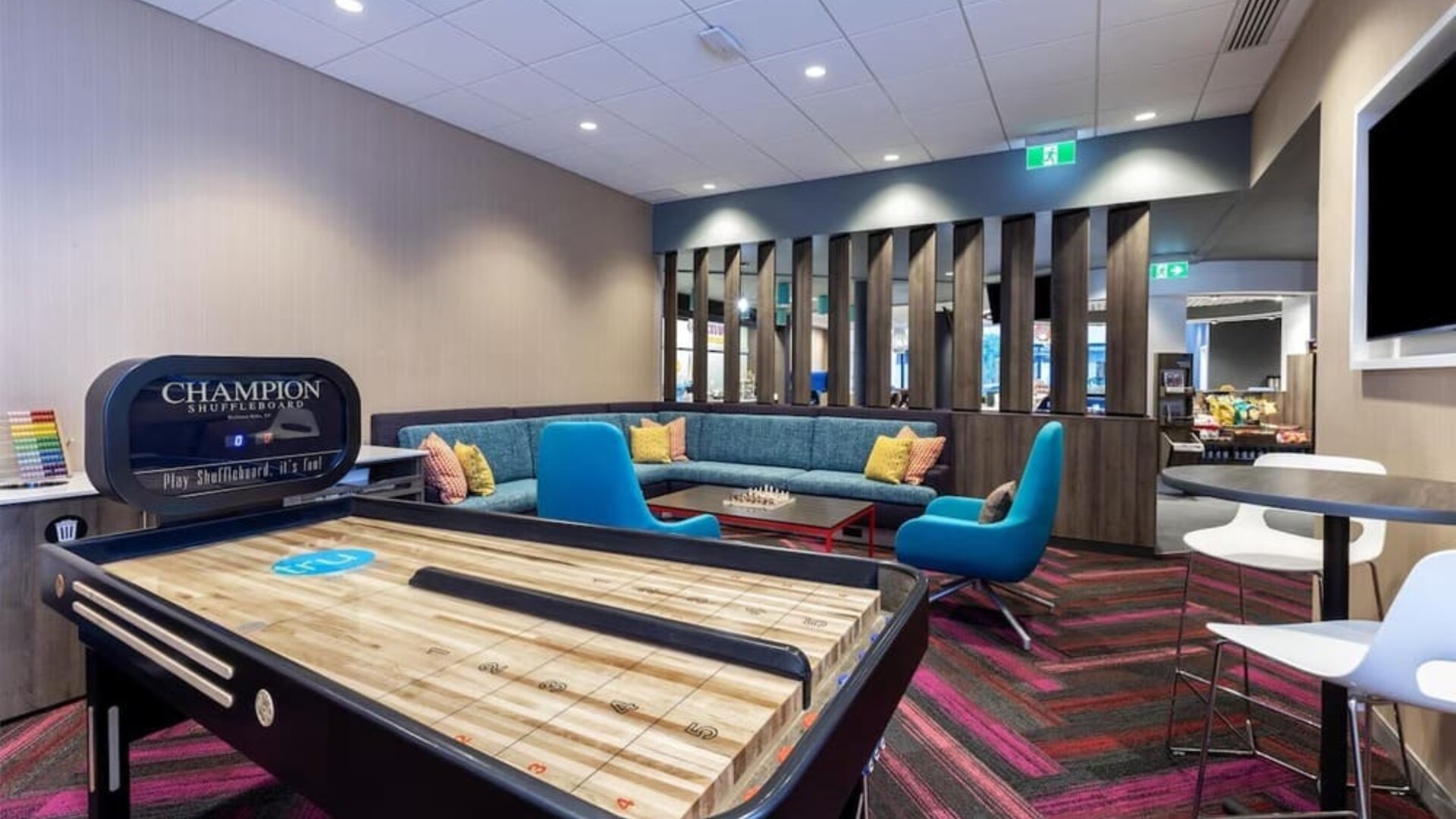 Game room with pool table at Tru By Hilton Montreal Centre-Ville.