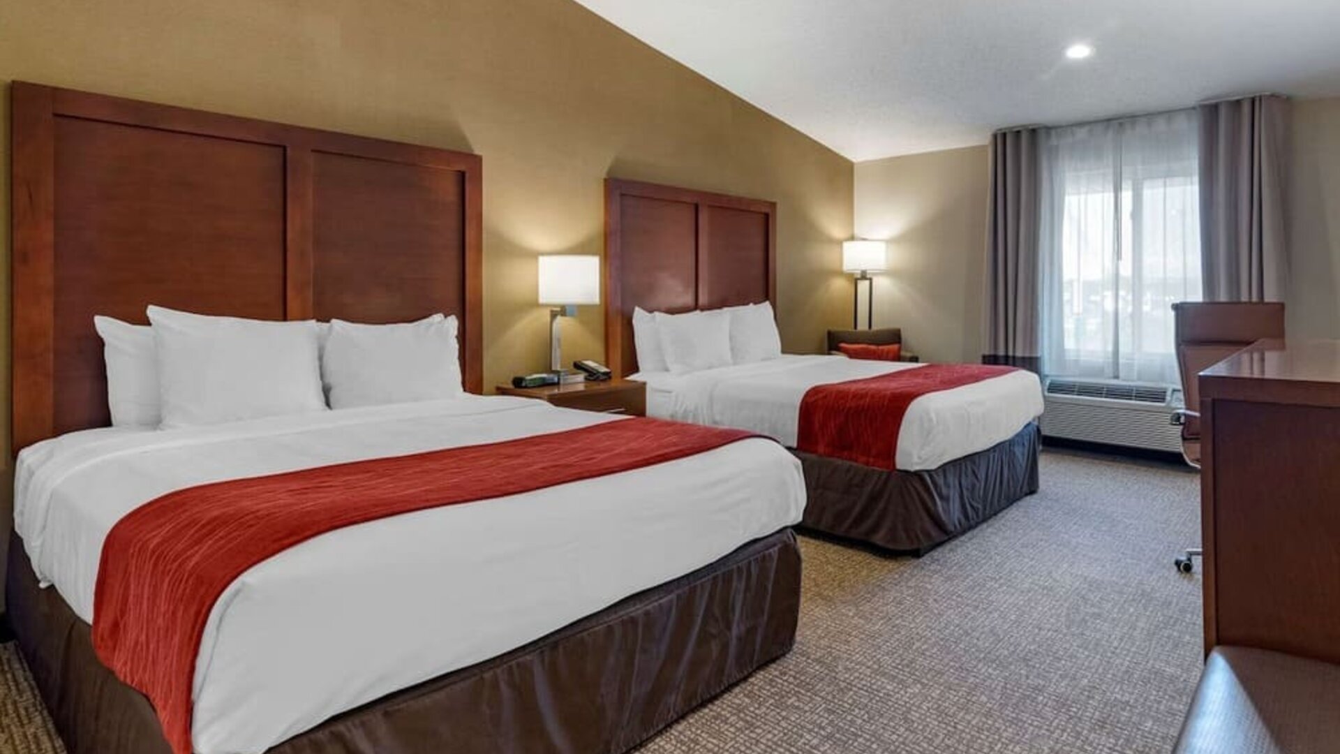 Day room with a desk, chair and plenty of natural light at Comfort Inn Glenmont - Albany South.