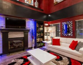 Lobby with comfortable seating at Coratel Inn And Suites By Jasper Wichita North.