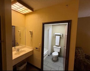 Bathroom at Coratel Inn And Suites By Jasper Wichita North