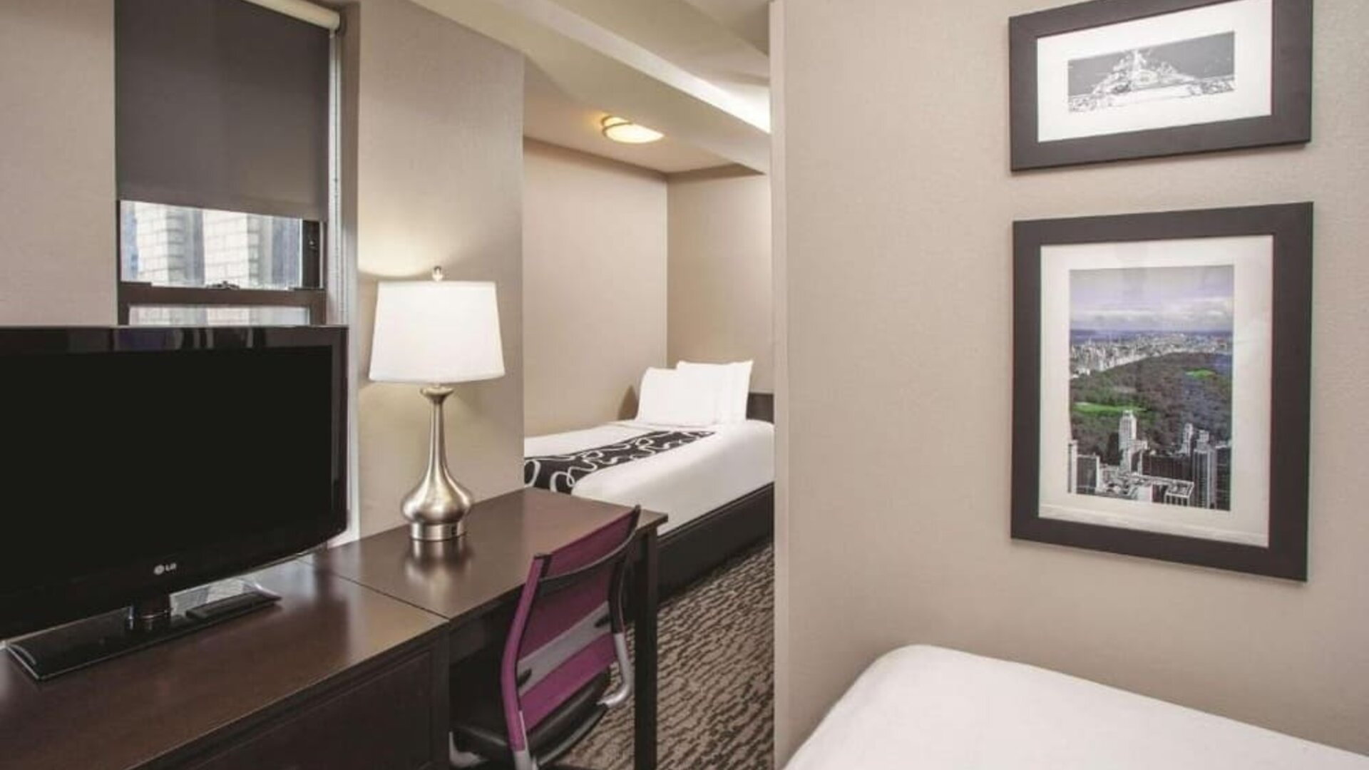 Day use room with work desk at La Quinta Inn & Suites By Wyndham New York City Central Park.