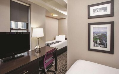 Day use room with work desk at La Quinta Inn & Suites By Wyndham New York City Central Park.