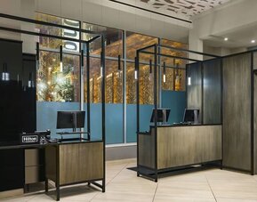 Beautiful reception area with welcoming staff at DoubleTree Times Square South.