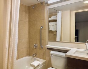 Bathroom with towels at Candlewood Suites Times Square.