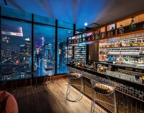 Rooftop bar overlooking the city at Aliz Hotel Times Square.