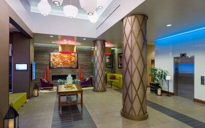 Lobby with comfortable seating at Hilton Garden Inn Midtown East..