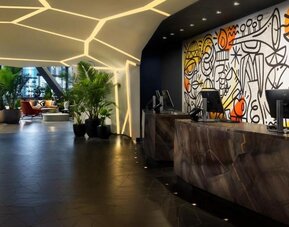 Modern and welcoming reception at M Social Hotel Times Square.