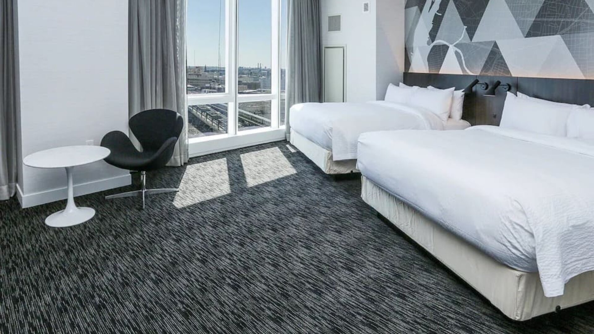 Day use room with workspace and natural light at Courtyard By Marriott Long Island City/New York Manhattan View.
