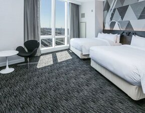 Day use room with workspace and natural light at Courtyard By Marriott Long Island City/New York Manhattan View.