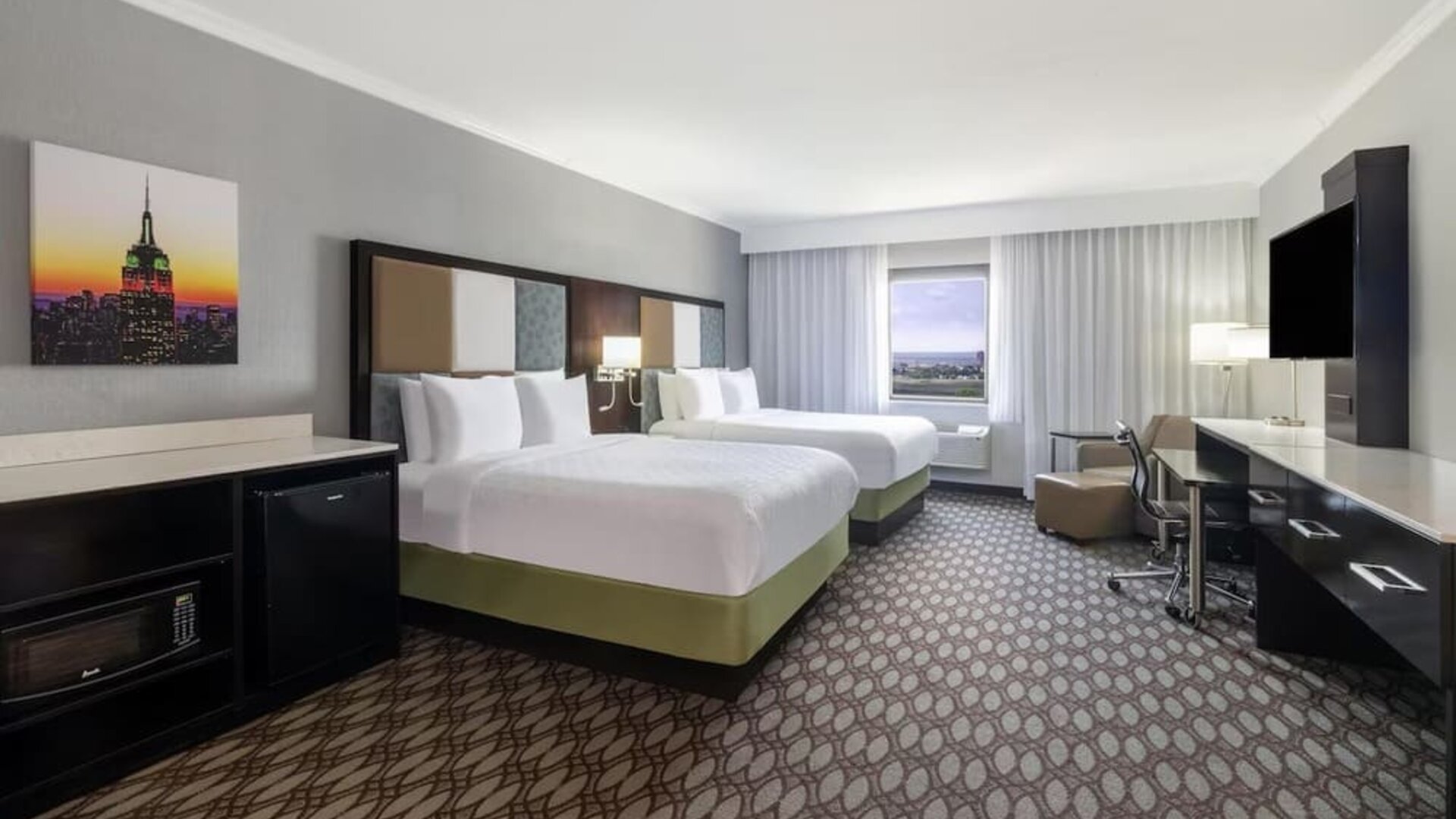 Day use room with work desk at Best Western Premier NYC Gateway.