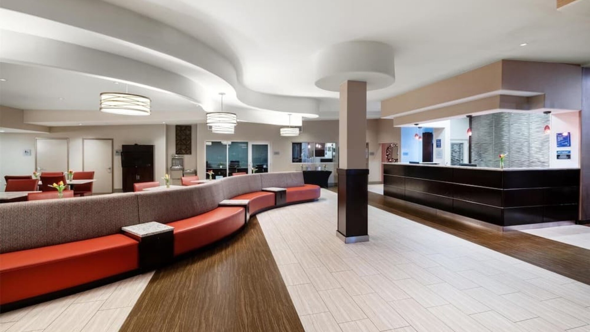 Lobby with comfortable seating at Best Western Premier NYC Gateway.