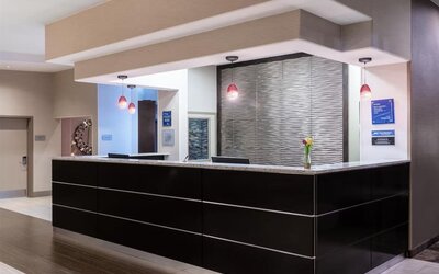 Reception desk at Best Western Premier NYC Gateway.