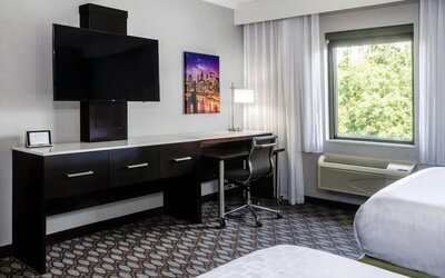 Day use room with work desk at Best Western Premier NYC Gateway.