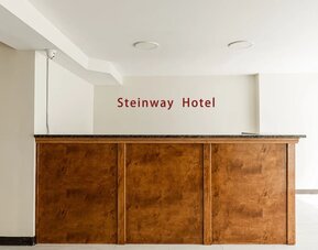 Reception at Astoria Inn LaGuardia Hotel.