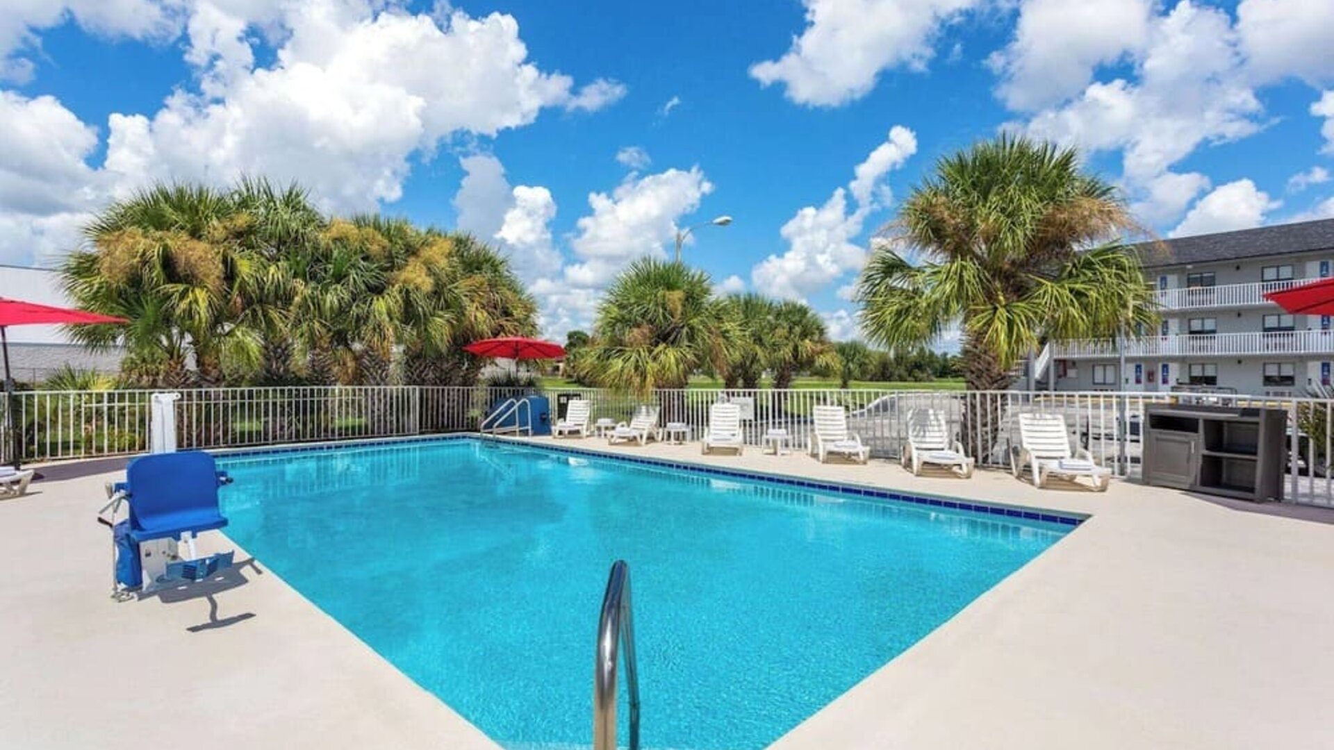 Outdoor pool at Howard Johnson by Wyndham Highway.