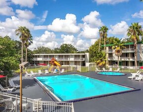 Relaxing outdoor pool at Baymont by Wyndham Maingate.