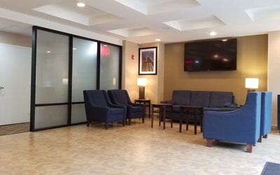 Lobby lounge area at Days Inn By Wyndham Brooklyn Marine Park.