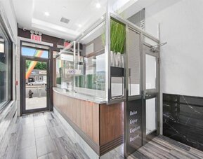 Bright, welcoming reception at Hotel 365 Bronx.