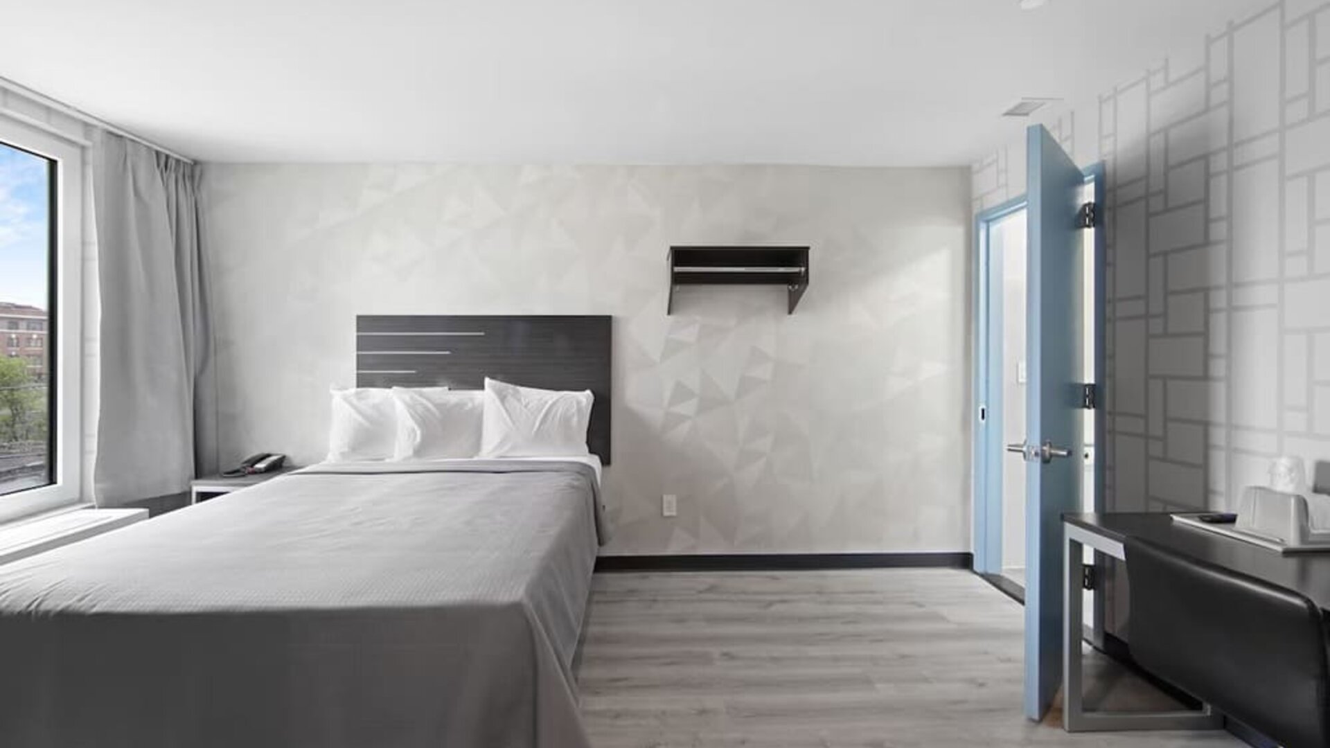 Day use room with work desk at Hotel 365 Bronx.