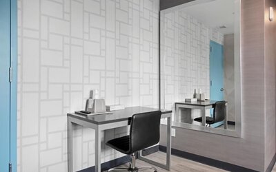 Day use room with work desk at Hotel 365 Bronx.