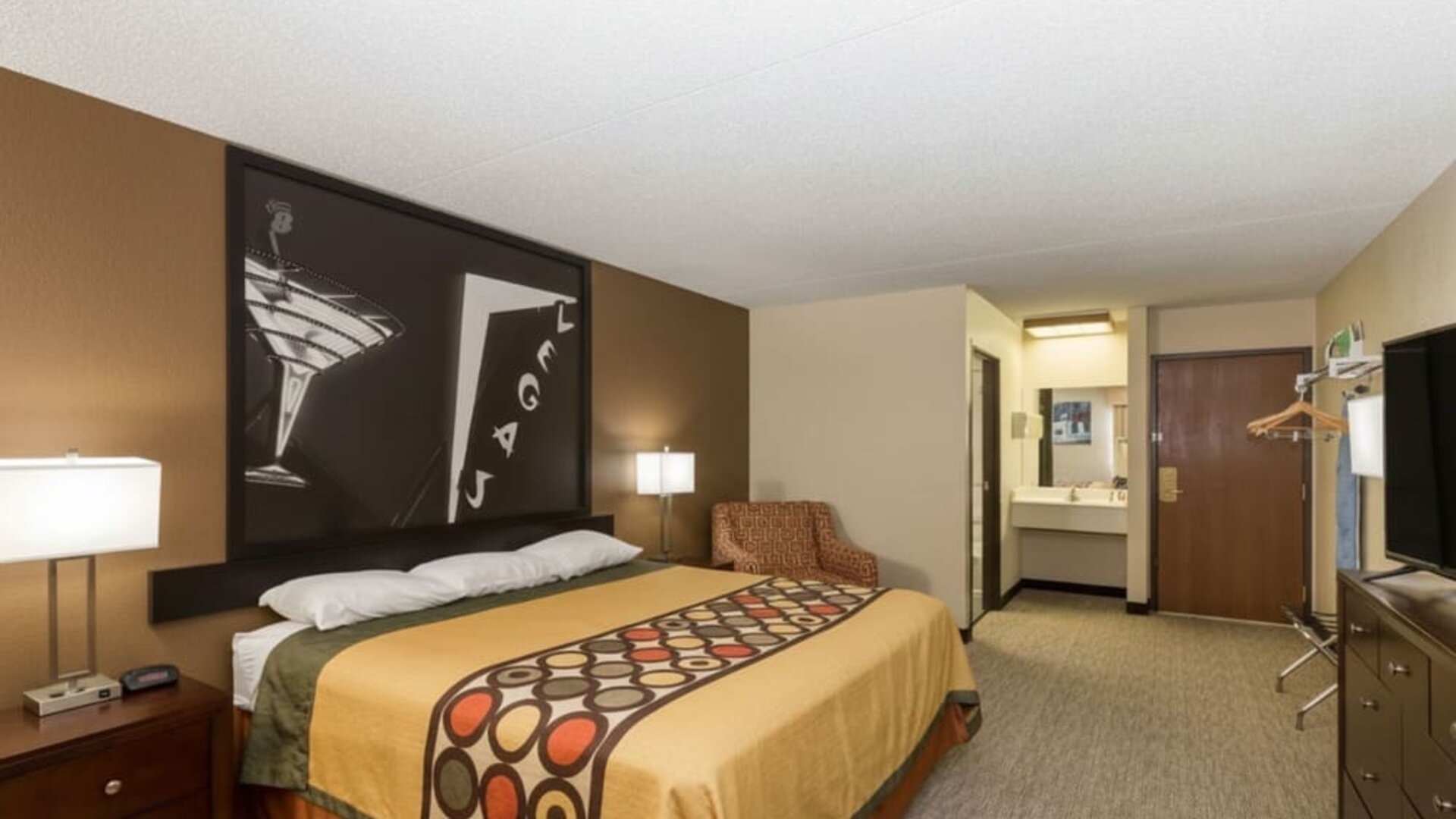 Day room with couch at Coratel Inn And Suites By Jasper Wichita North.
