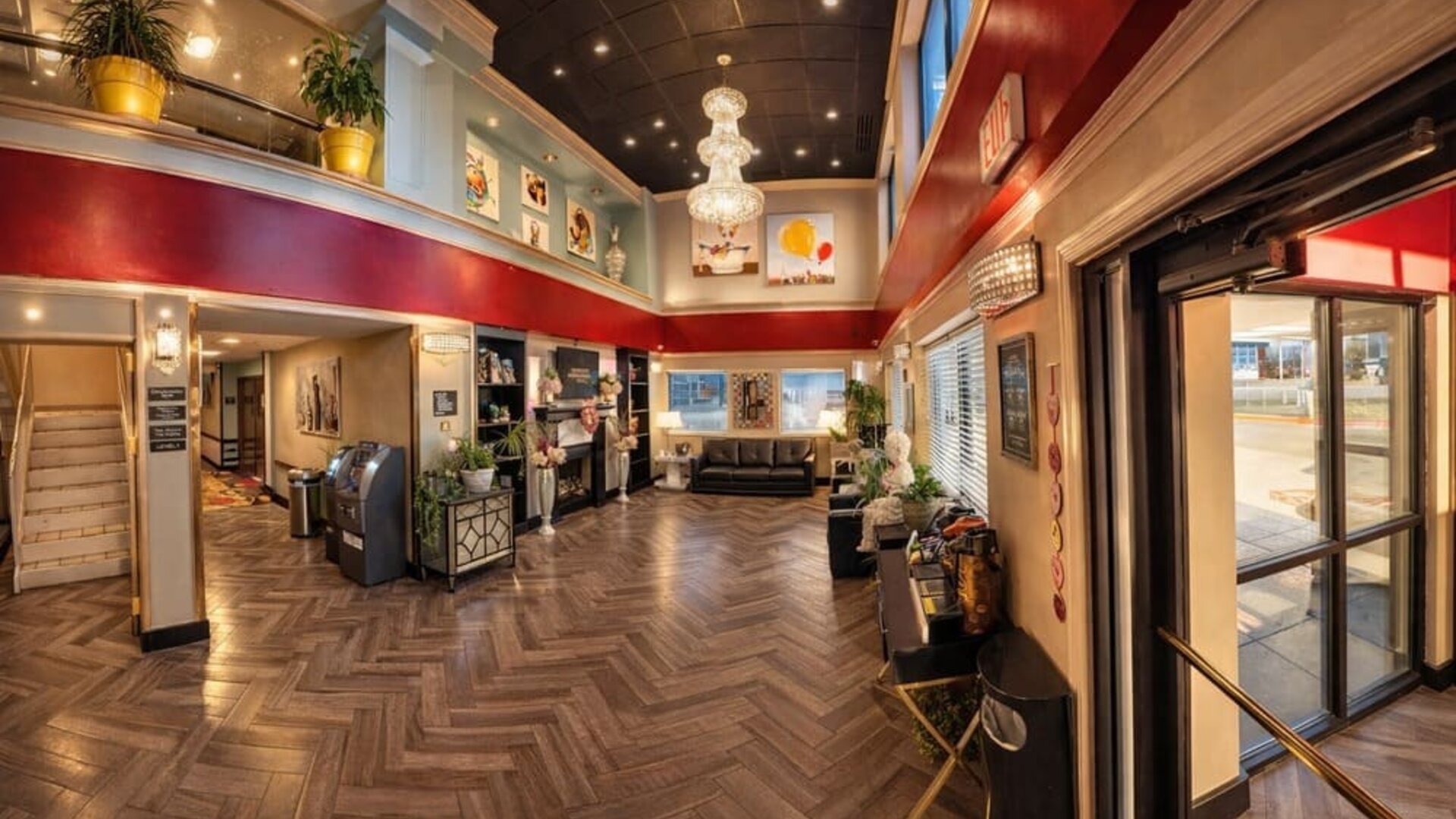 Lobby area with seating at Coratel Inn And Suites By Jasper Wichita North.