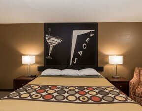 Day room with couch at Coratel Inn And Suites By Jasper Wichita North.