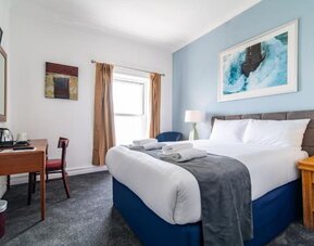 Day room with workspace at The Southcliff Hotel.