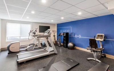 Fitness center at Holiday Inn Express Chicago - Downers Grove.