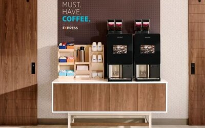 Coffee station at Holiday Inn Express Chicago - Downers Grove.