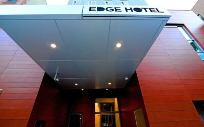 Entrance view with Edge Hotel signage and modern exterior design at Edge Hotel NYC.