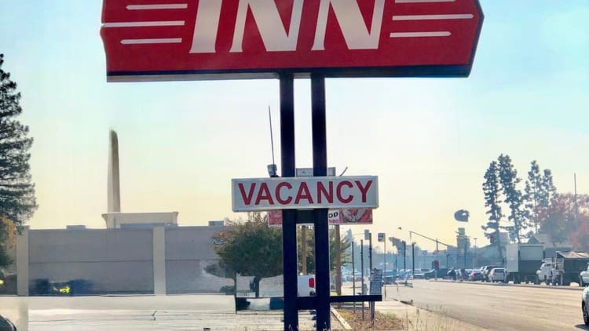 Hotel sign at Economy Inn.