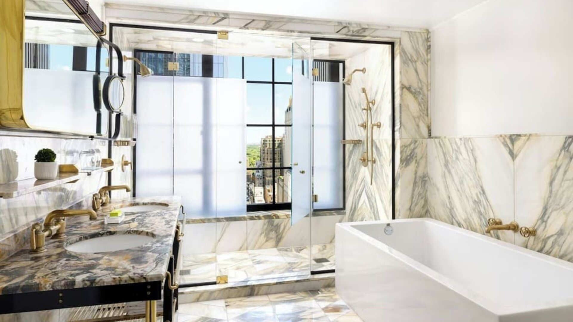 Luxury bathroom with marble finishes, double sink, bathtub, and glass-enclosed shower at Le Méridien New York, Central Park.