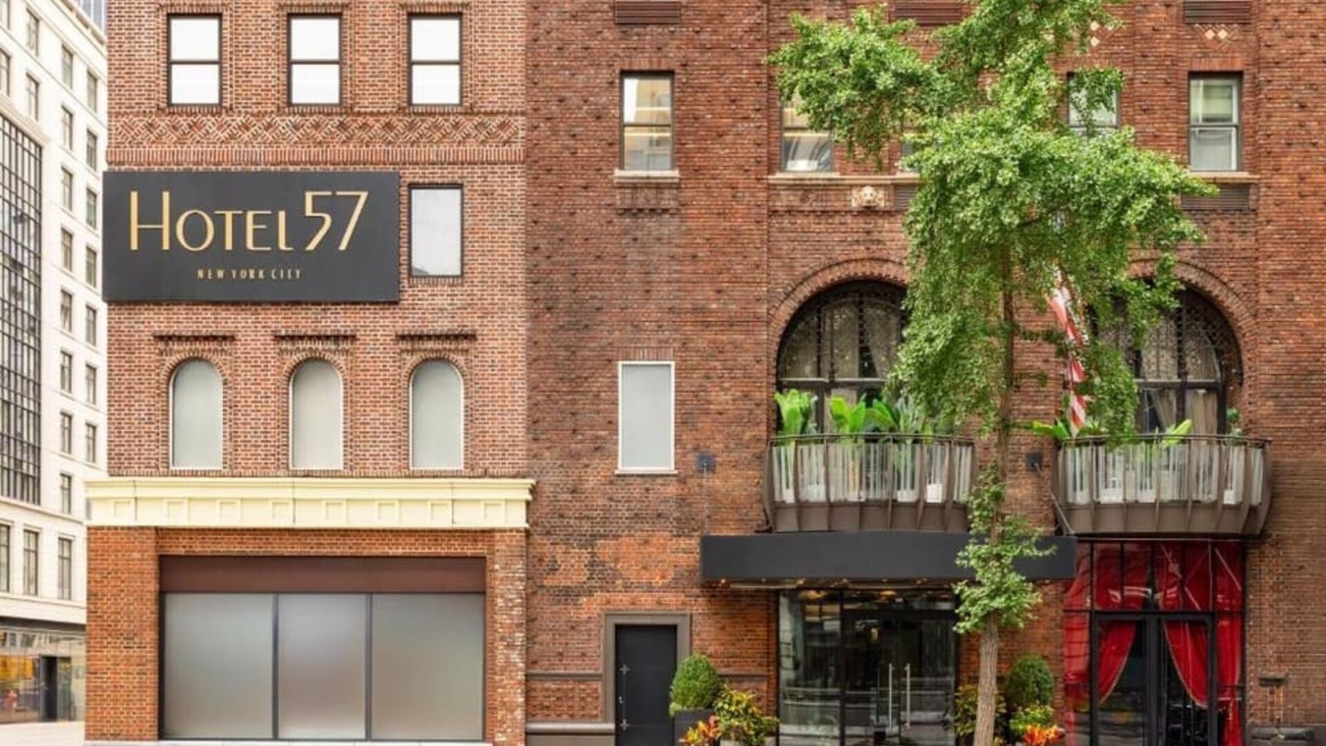 Hotel exterior with entrance signage at Hotel 57.