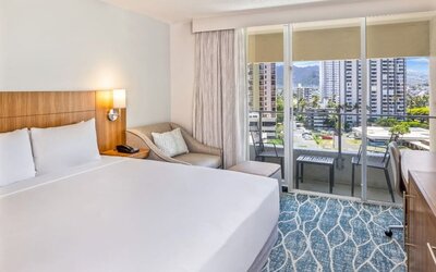 King suite with balcony at Hyatt Place Waikiki Beach.