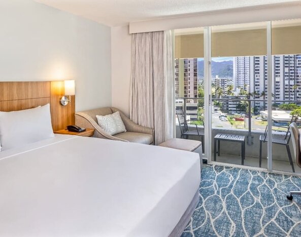 King suite with balcony at Hyatt Place Waikiki Beach.