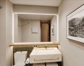 Guest bathroom with basin at DoubleTree By Hilton Wilkes-Barre.