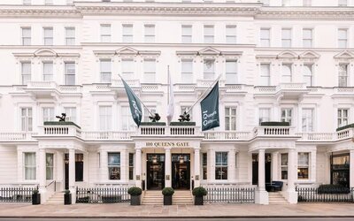 Hotel exterior with white walls at 100 Queen's Gate Hotel London.