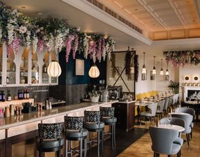 Cozy hotel bar at 100 Queen's Gate Hotel London.