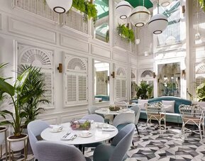 Dining room with natural light at 100 Queen's Gate Hotel London.
