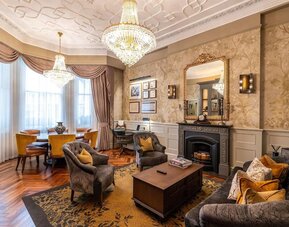 Lounge and library at 100 Queen's Gate Hotel London.