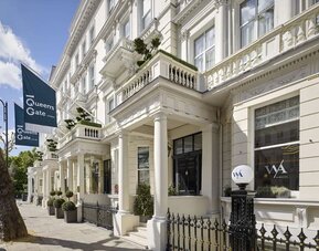 Hotel exterior with white walls at 100 Queen's Gate Hotel London.