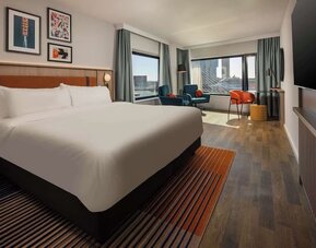 Day use room with natural light and TV at DoubleTree By Hilton Rotterdam Centre.