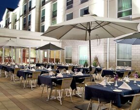 Outdoor dining available at Hilton Garden Inn Montreal Airport.