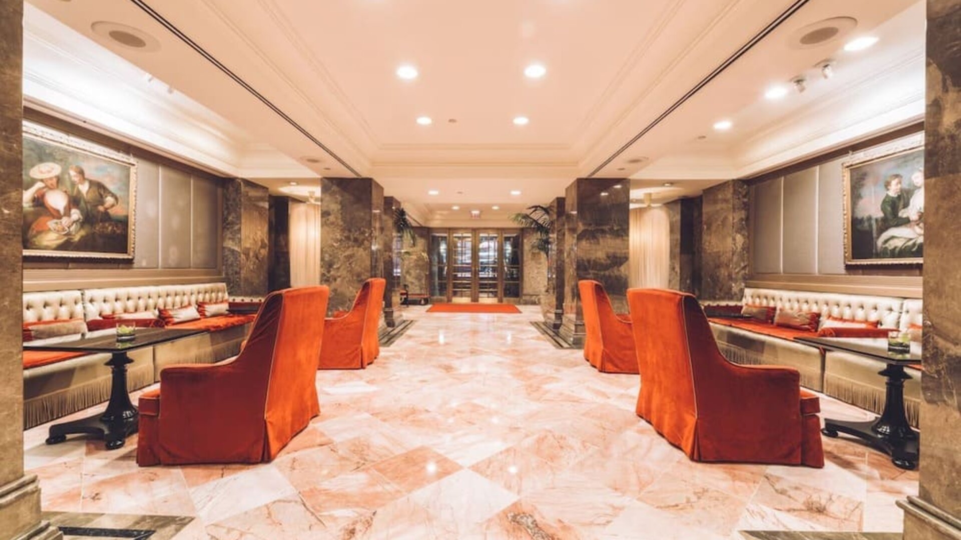 Elegant lobby seating area with classic decor and soft lighting at The Michelangelo New York.