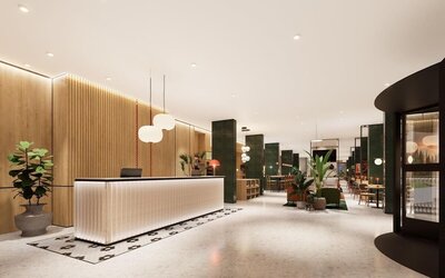 Bright reception hall with illuminated front desk, wood paneling, lounge seating, and dining area