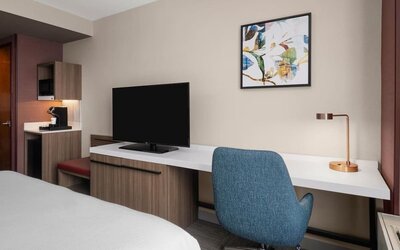 In-room workspace and television at Hilton Garden Inn New York/West 35th Street.